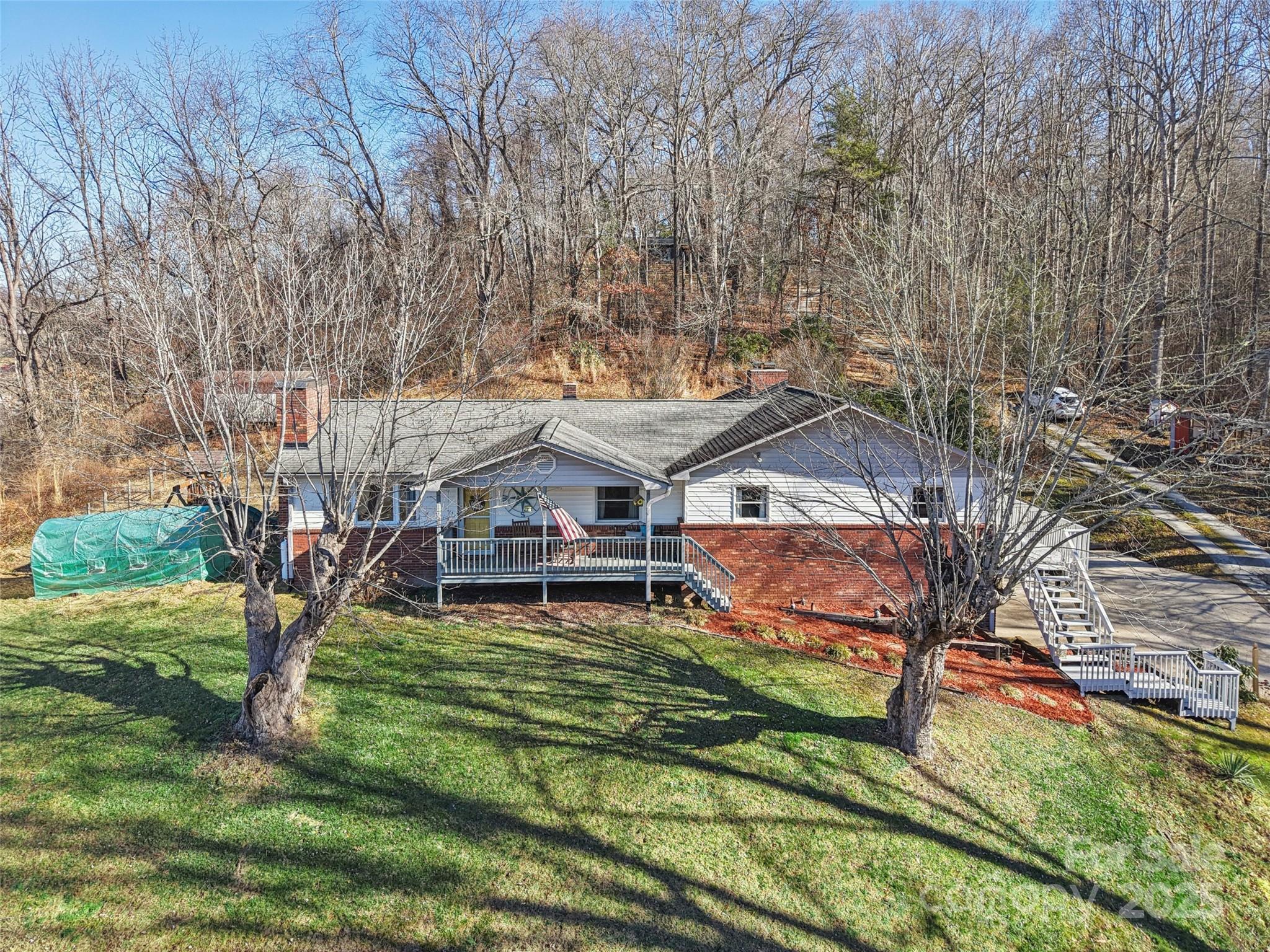57 Bittersweet Trail Canton, NC 28716 - Photo 39 of 40 aerial view of a house with a yard
