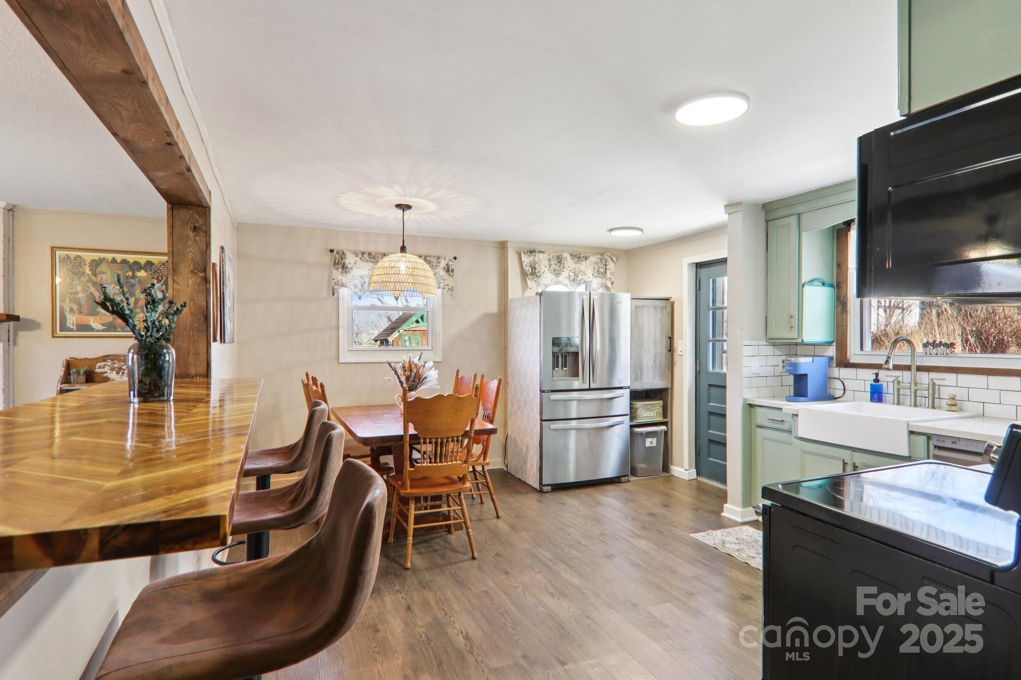 57 Bittersweet Trail Canton, NC 28716 - Photo 10 of 40 a dining room with furniture and window