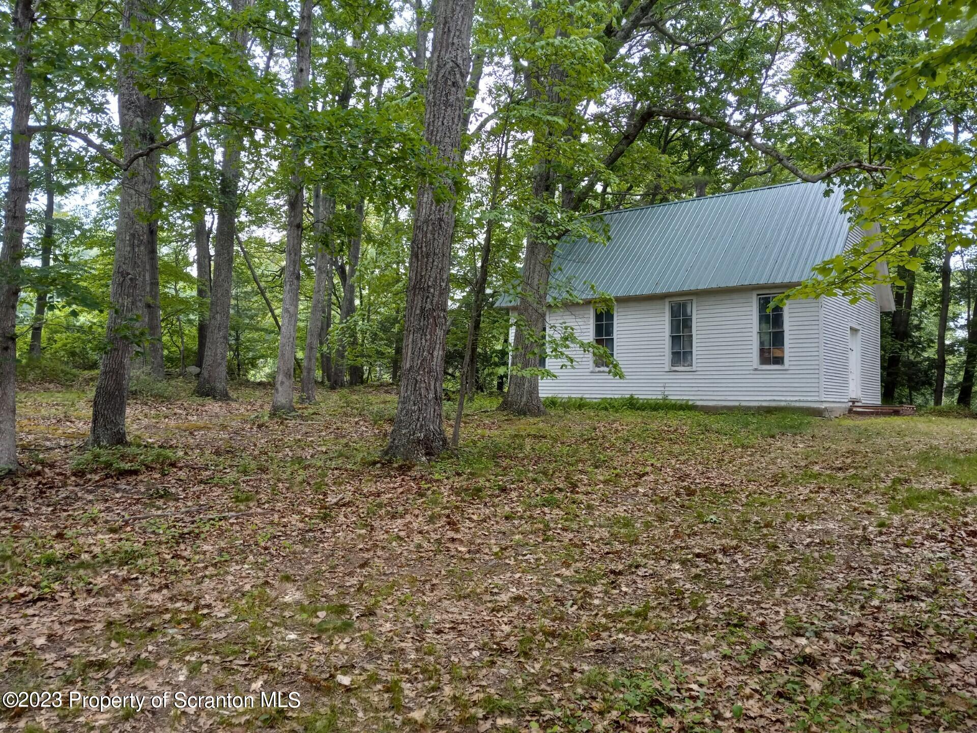 Mill Lane Tunkhannock, PA 18657 - Photo 3 of 6 a backyard of a house with lots of green space