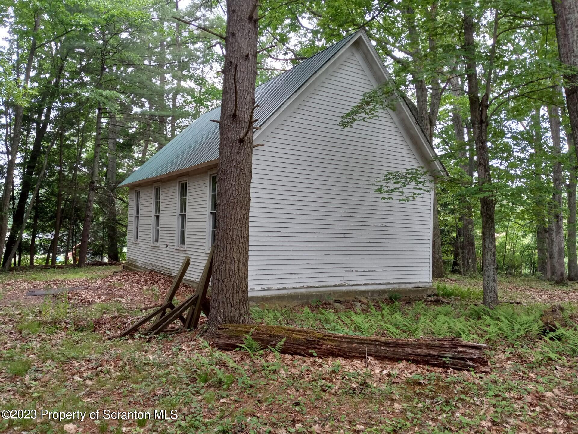 Mill Lane Tunkhannock, PA 18657 - Photo 4 of 6 a view of a house with a yard and tree