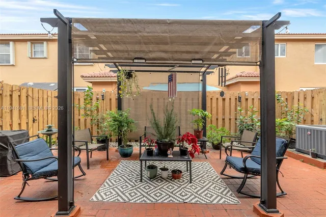 a view of balcony with furniture