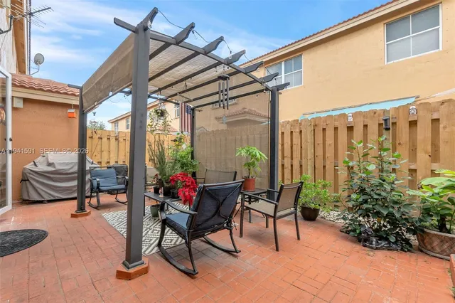 a living room filled with furniture and a table