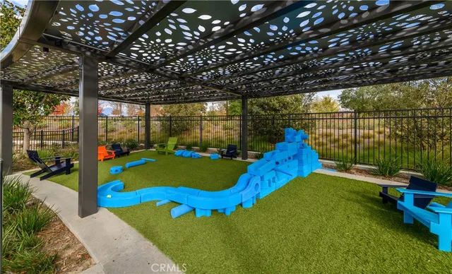 a park with a wooden bench sitting area