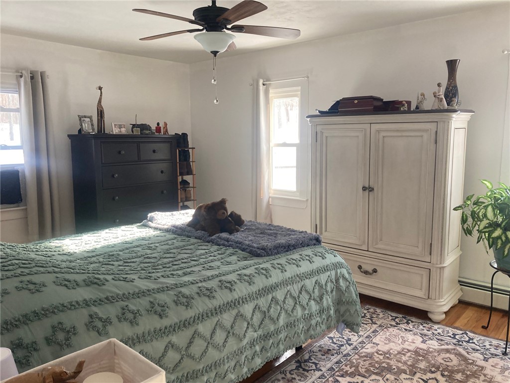 29 Mt Hygeia Road Foster, RI 02825 - Photo 3 of 25 bright sunny bedroom with hardwood floors