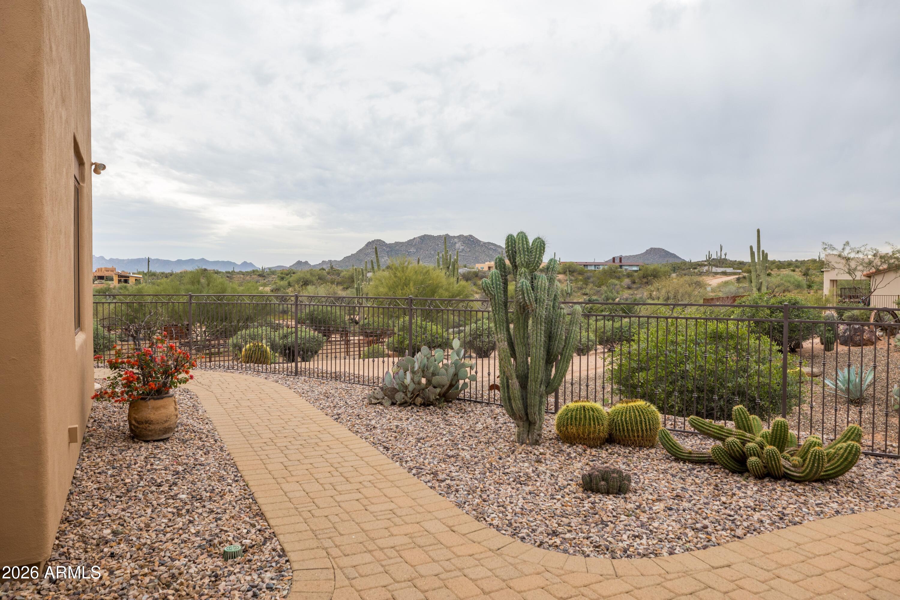 13906 East Montello Road Scottsdale, AZ 85262 - Photo 16 of 110 a view of a terrace with a bench