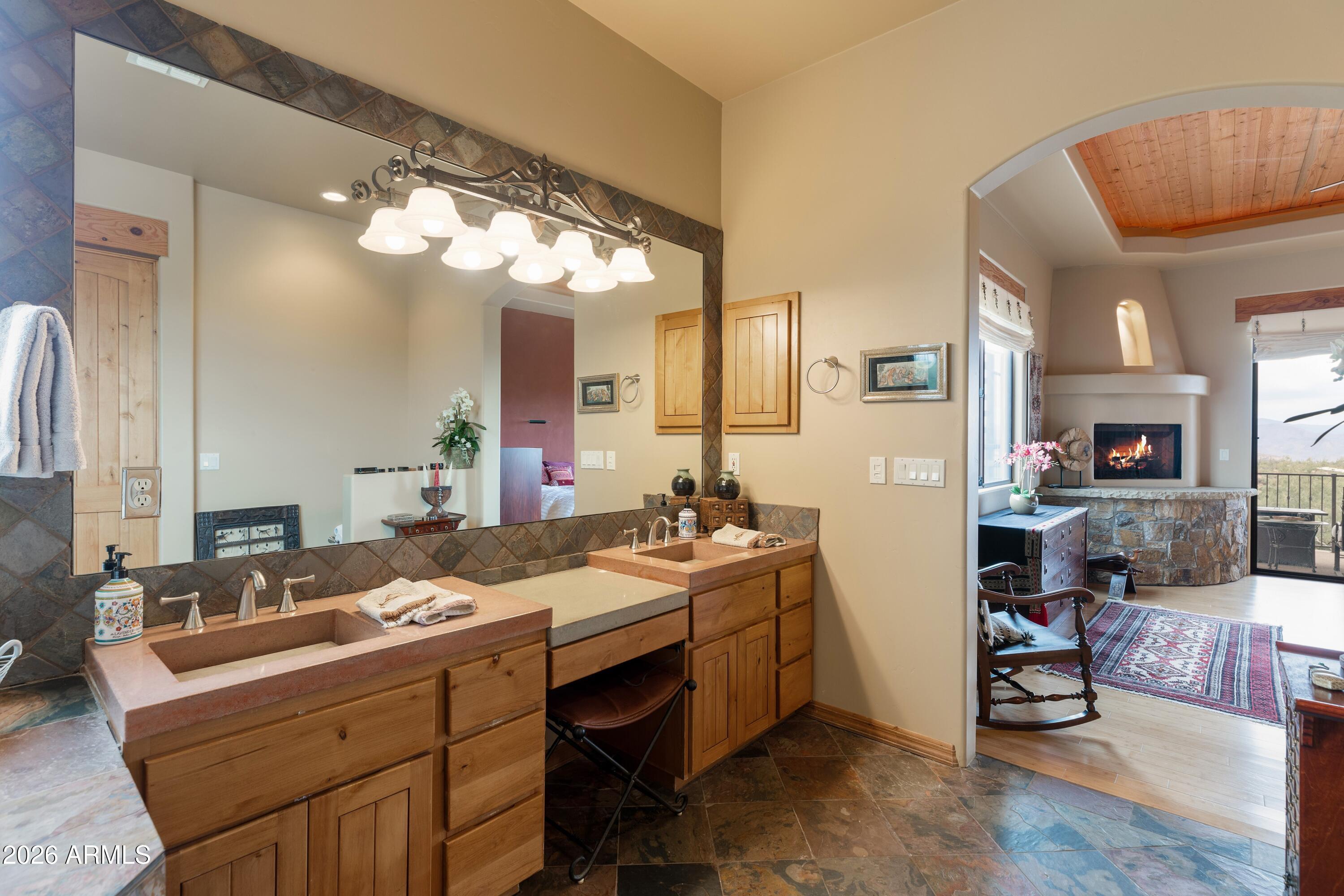 13906 East Montello Road Scottsdale, AZ 85262 - Photo 32 of 110 a bathroom with a double vanity sink mirror and bathtub