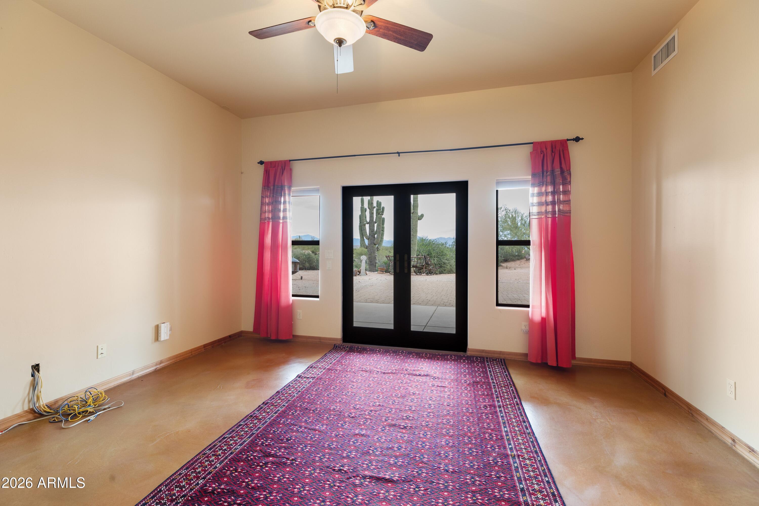 13906 East Montello Road Scottsdale, AZ 85262 - Photo 41 of 110 wooden floor in an empty room with a window