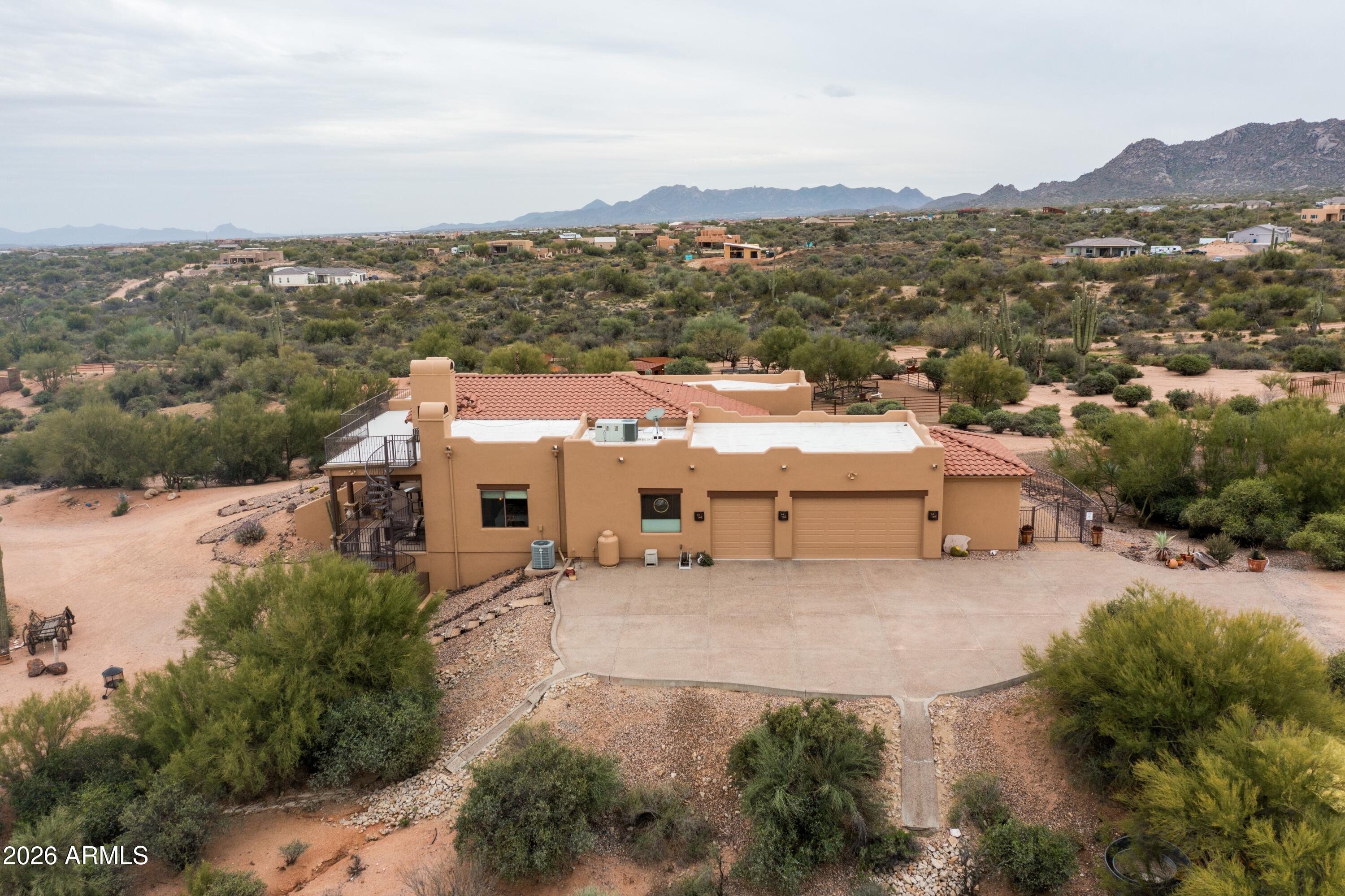 13906 East Montello Road Scottsdale, AZ 85262 - Photo 92 of 110 an aerial view of a house with a yard