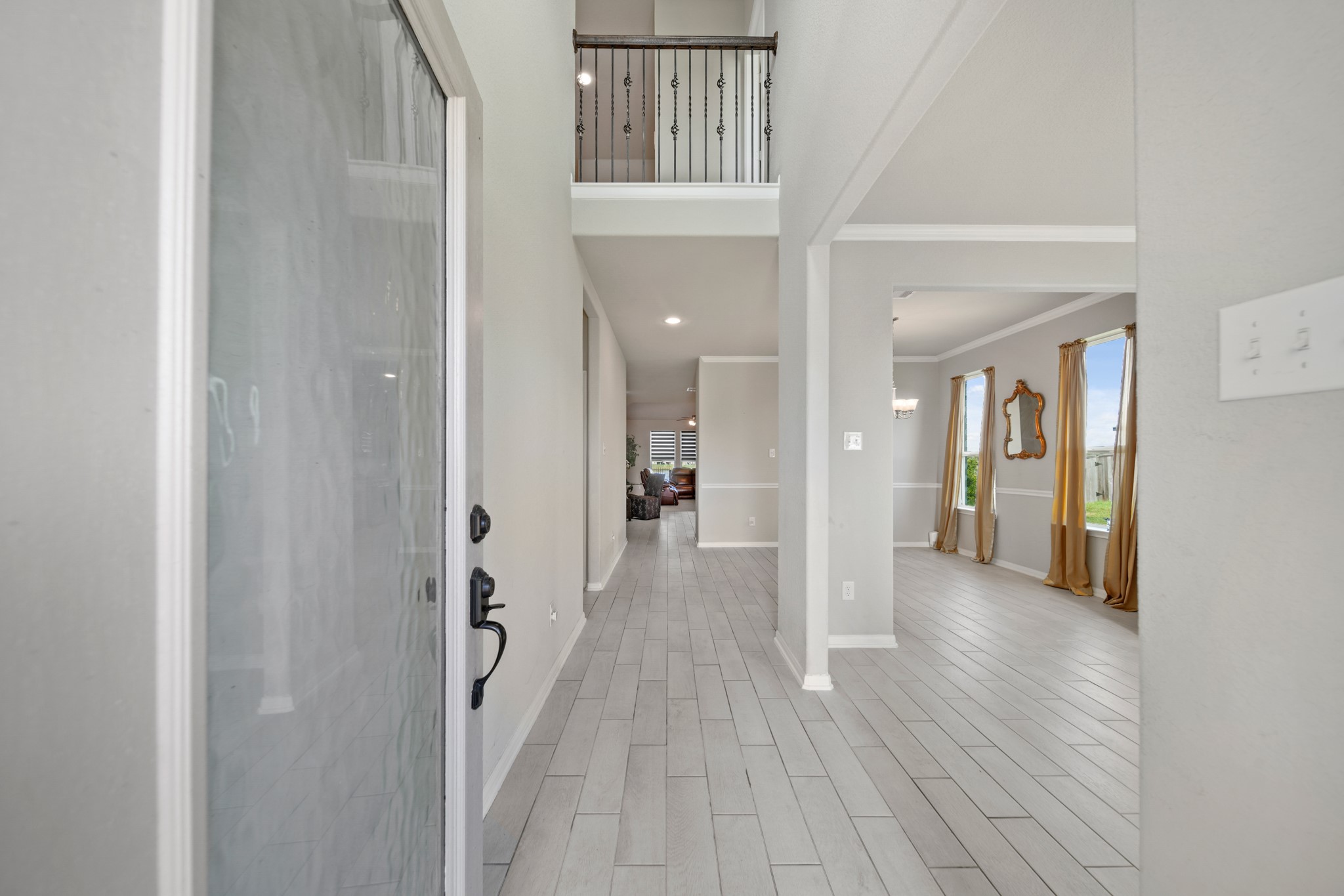 8802 Mallow Rose Way Rosharon, TX 77583 - Photo 7 of 29 You'll be instantly greeted by beautiful tile floors.