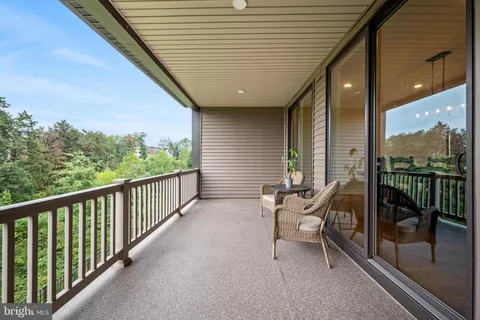 a balcony with furniture