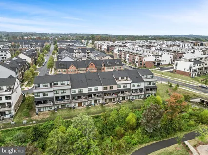 a view of a city with tall buildings in front of it