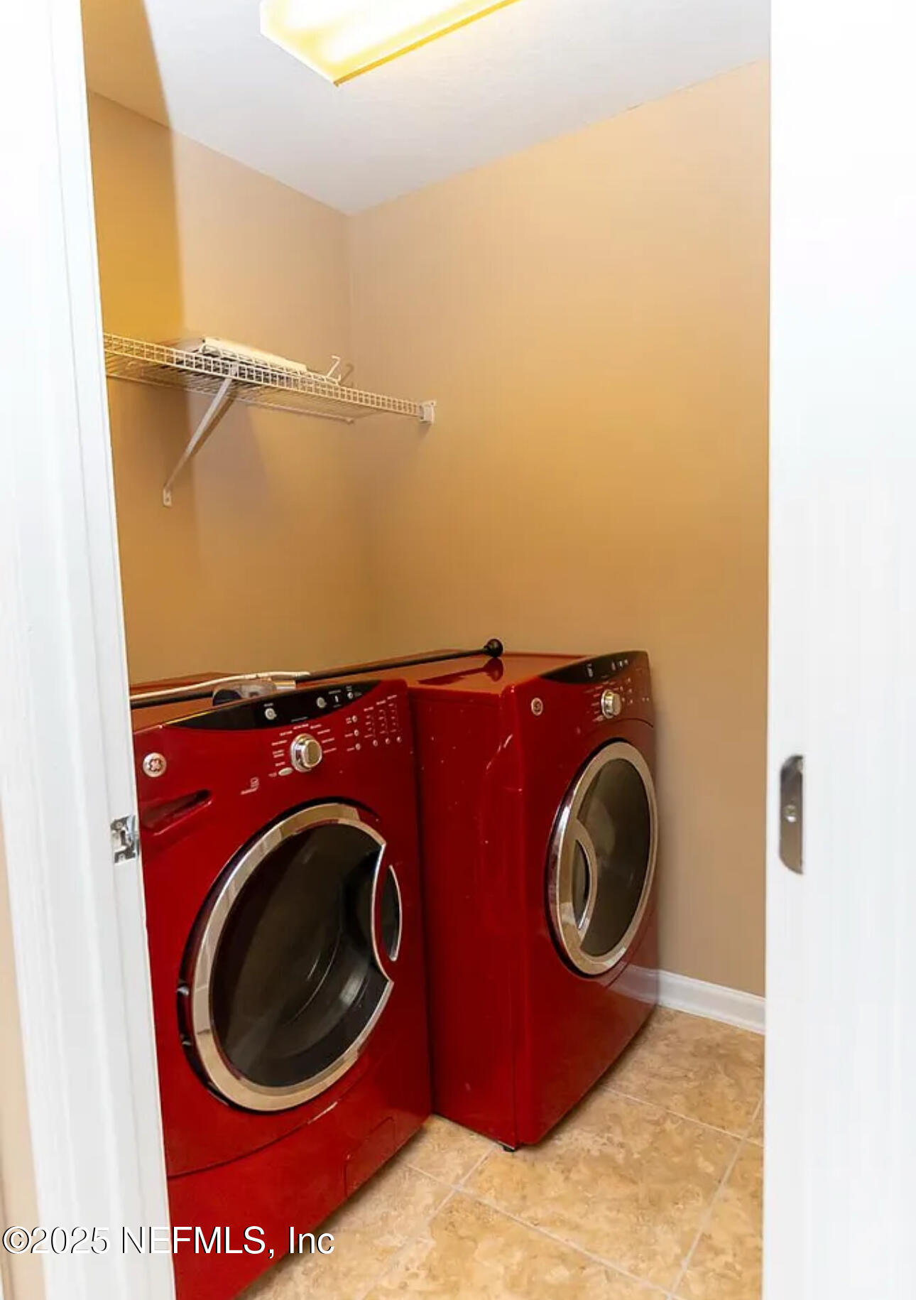 4204 Metron Drive Jacksonville, FL 32216 - Photo 17 of 24 a utility room with dryer and washer