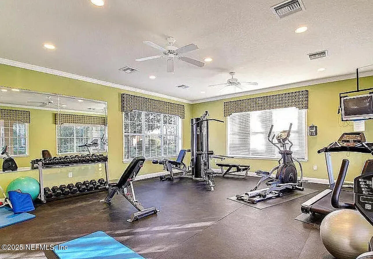 4204 Metron Drive Jacksonville, FL 32216 - Photo 19 of 24 a view of a room with gym equipment