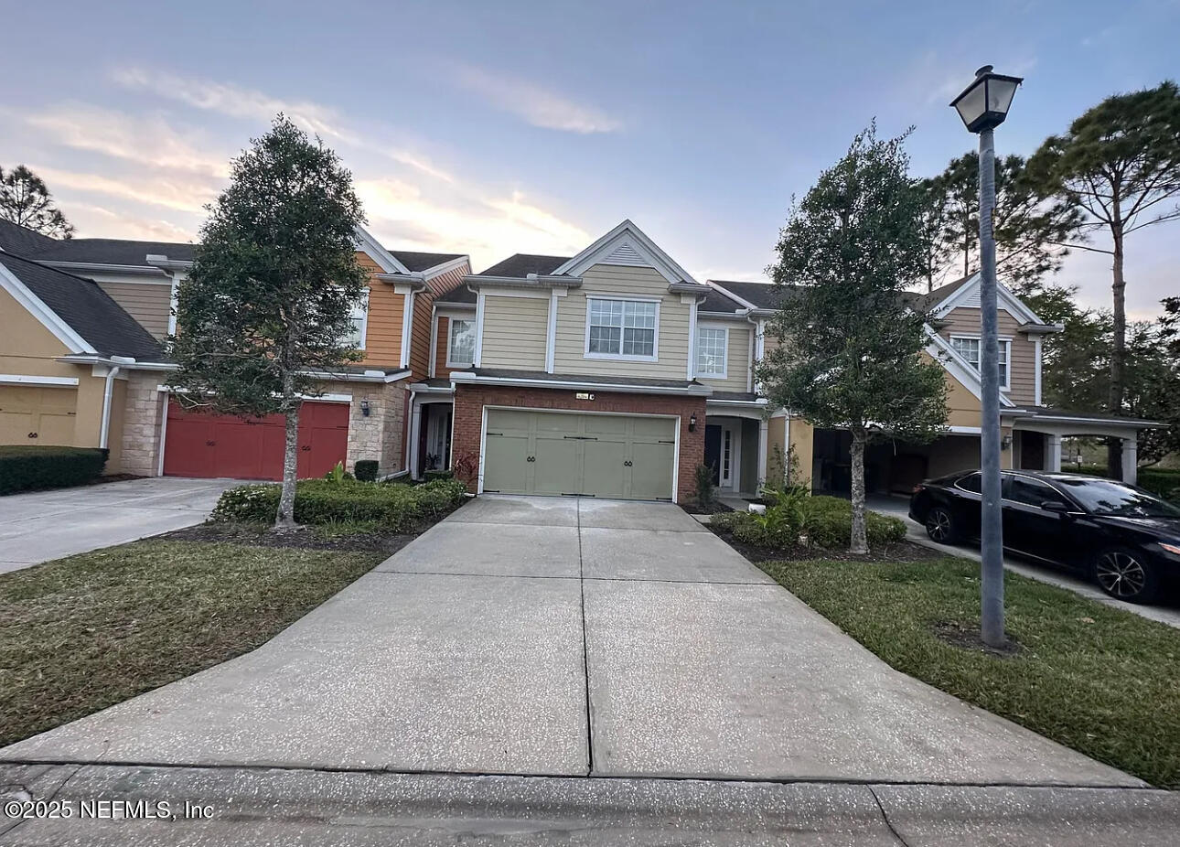 4204 Metron Drive Jacksonville, FL 32216 - Photo 2 of 24 a front view of house with yard and green space