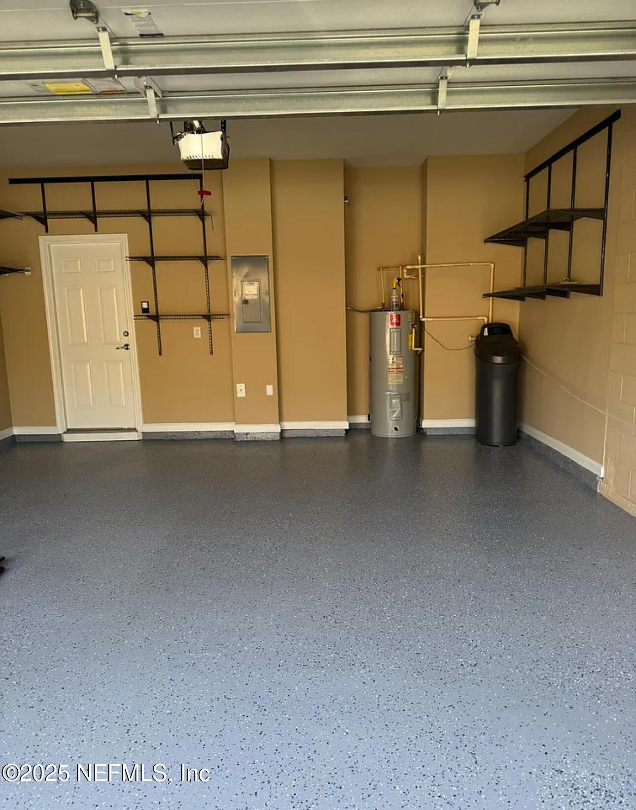 4204 Metron Drive Jacksonville, FL 32216 - Photo 21 of 24 a view of a room with rack on the wall