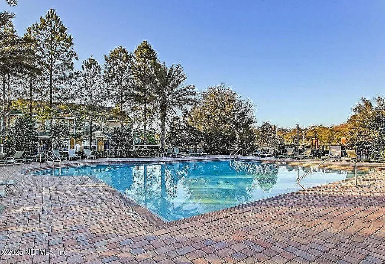4204 Metron Drive Jacksonville, FL 32216 - Photo 24 of 24 a view of swimming pool with outdoor space and seating area