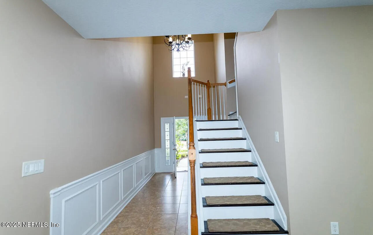 4204 Metron Drive Jacksonville, FL 32216 - Photo 4 of 24 a view of entryway with wooden floor