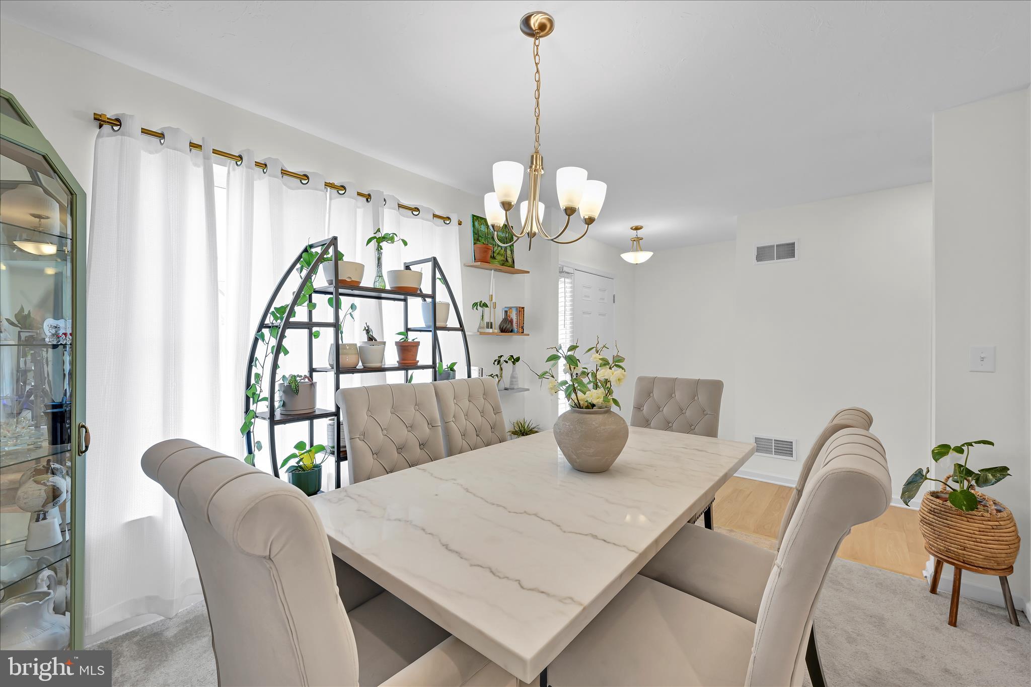 2625 Village Road Dover, PA 17315 - Photo 3 of 15 a view of a dining room with furniture and chandelier