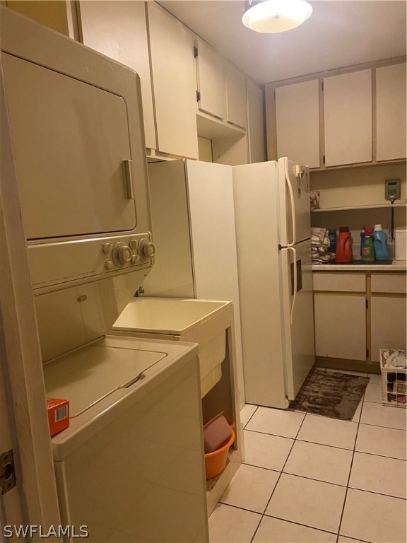 119 Apache Street Lehigh Acres, FL 33936 - Photo 25 of 29 a utility room with dryer and washer