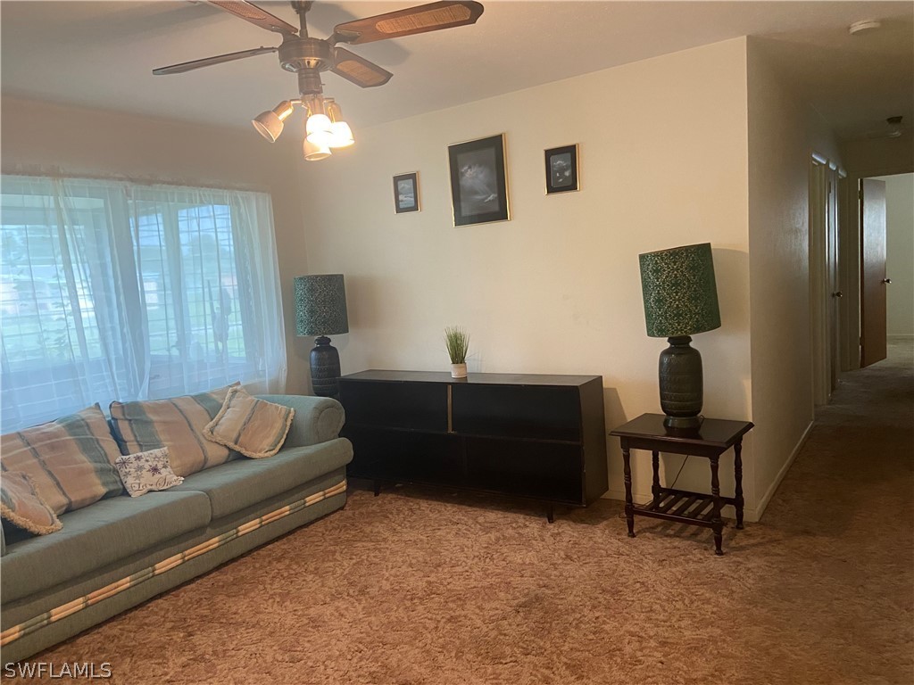 119 Apache Street Lehigh Acres, FL 33936 - Photo 9 of 29 a living room with furniture