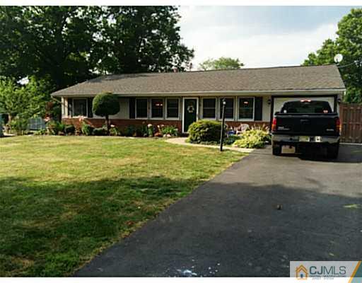 8 Winant Road Kendall Park, NJ 08824 - Photo 22 of 23 a view of a house with backyard sitting area and porch
