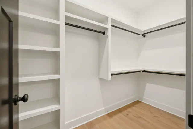 a view of an empty walk in closet