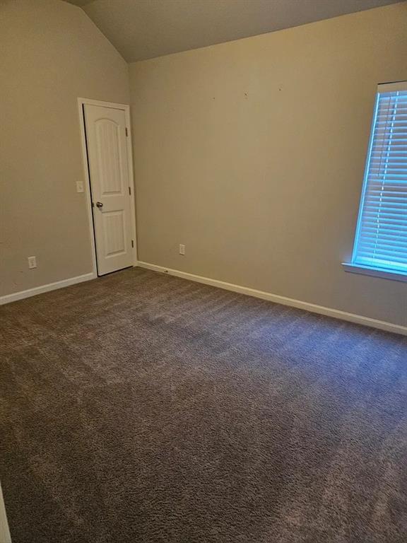 7373 Ledgestone Lane Riverdale, GA 30274 - Photo 11 of 13 an empty room with windows