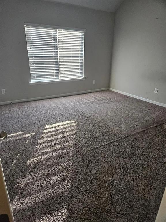 7373 Ledgestone Lane Riverdale, GA 30274 - Photo 13 of 13 a view of wooden floor and windows in a room