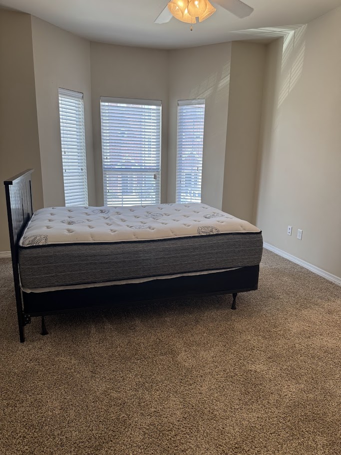 1198 Jones-Butler Road, Unit 1904 College Station, TX 77840 - Photo 9 of 17 Bedroom with carpet and ceiling fan