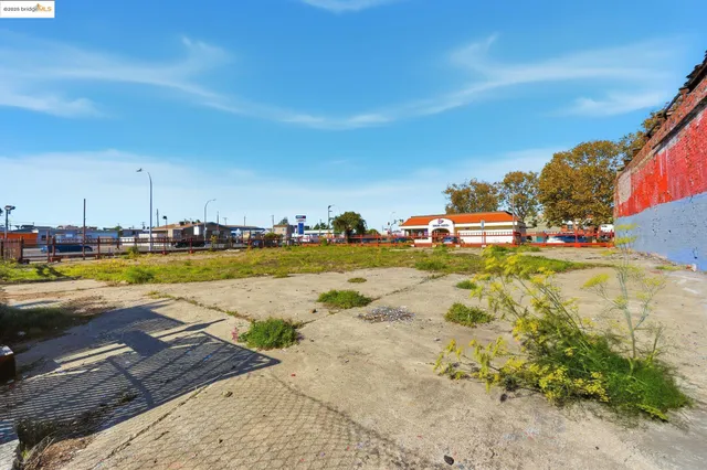 a view of a swimming pool with an ocean view