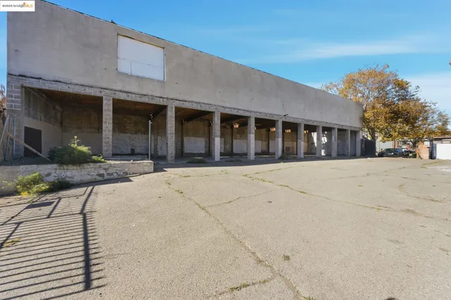 front view of a brick house with a outdoor space