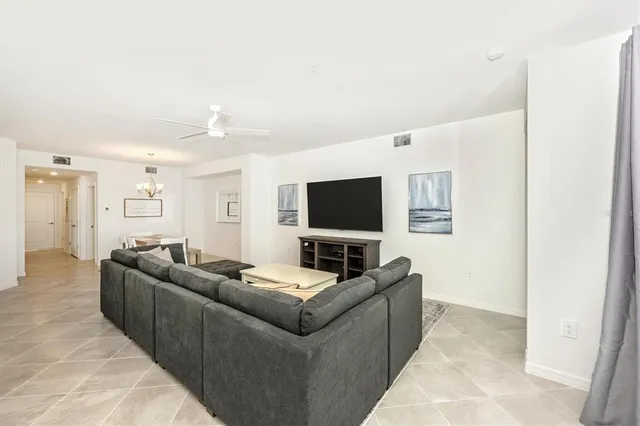 a bathroom with double sink and a mirror