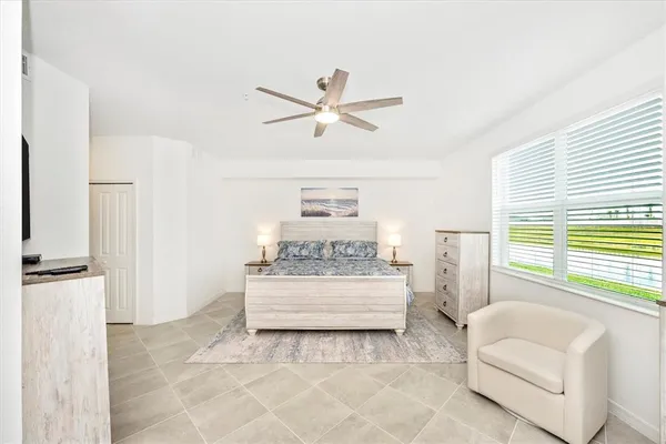 a bathroom with a shower a sink and a mirror