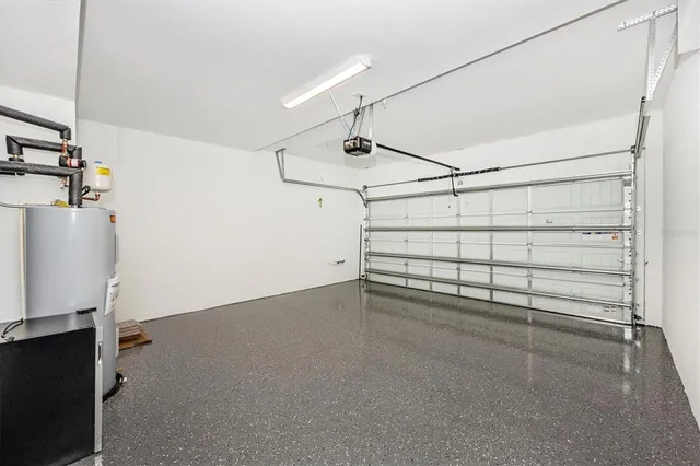 a view of a golf course with an ocean