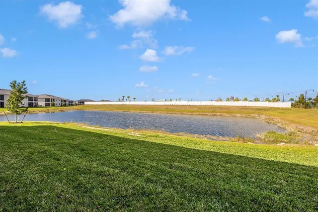 a view of a lake with a outdoor space