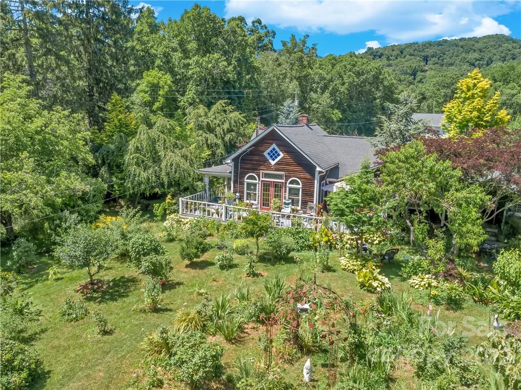 528 Padgettown Road Black Mountain, NC 28711 - Photo 19 of 37 a front view of a house with a yard and trees