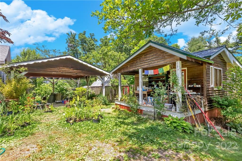528 Padgettown Road Black Mountain, NC 28711 - Photo 25 of 37 a front view of a house with garden
