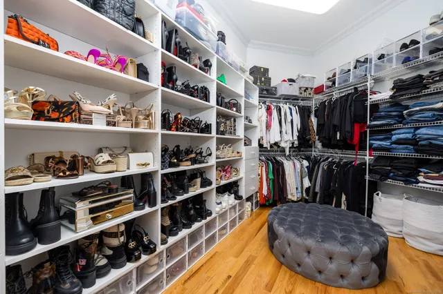 a room with lots of different colored cloths