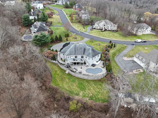 a view of a swimming pool with a garden