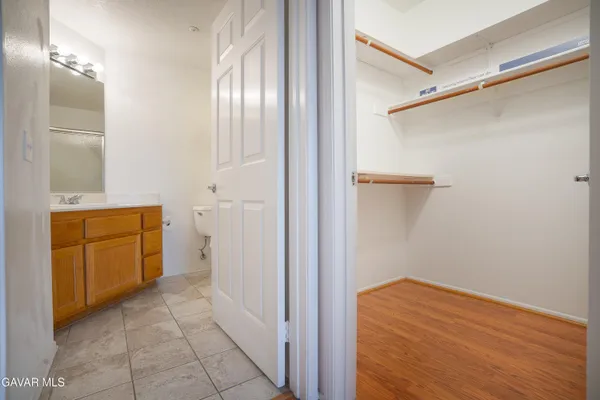 an empty room with shelves