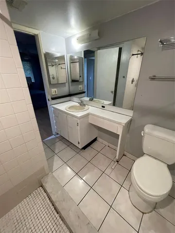 a view of a room with a large window