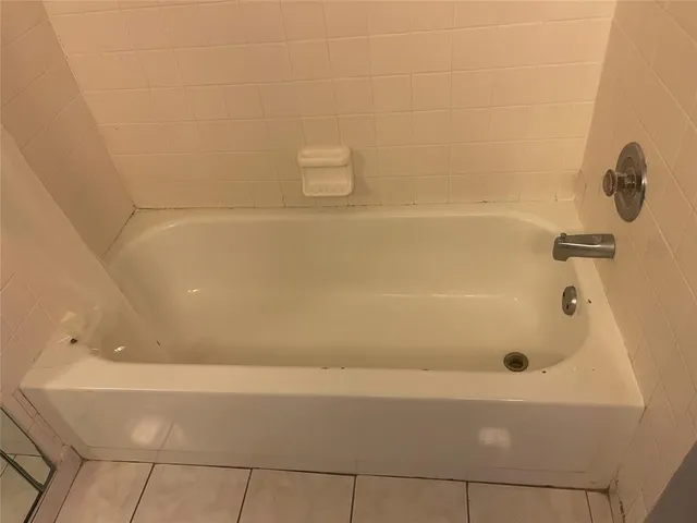 a view of a backyard with sitting area and furniture