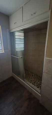 a bathroom with a toilet sink and vanity