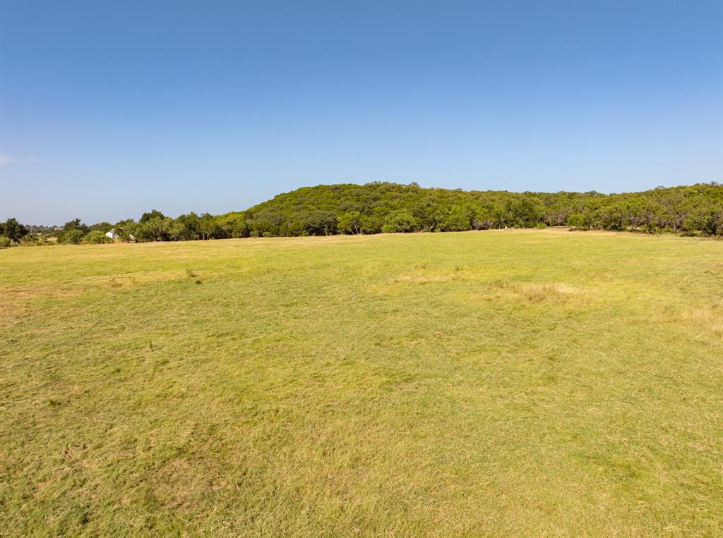 4171 Pleasant Valley Road Mineral Wells, TX 76067 - Photo 18 of 34 a view of an ocean from a mountain