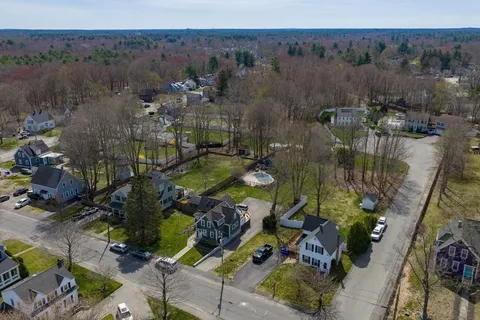 an aerial view of residential house with outdoor space