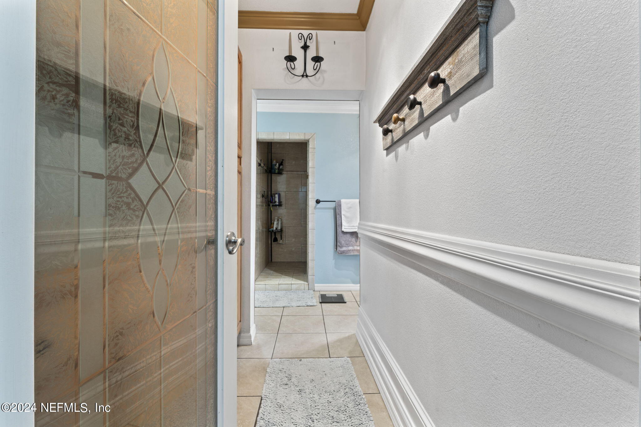 542284 Lem Turner Road Callahan, FL 32011 - Photo 24 of 84 a bathroom with a shower and a glass door