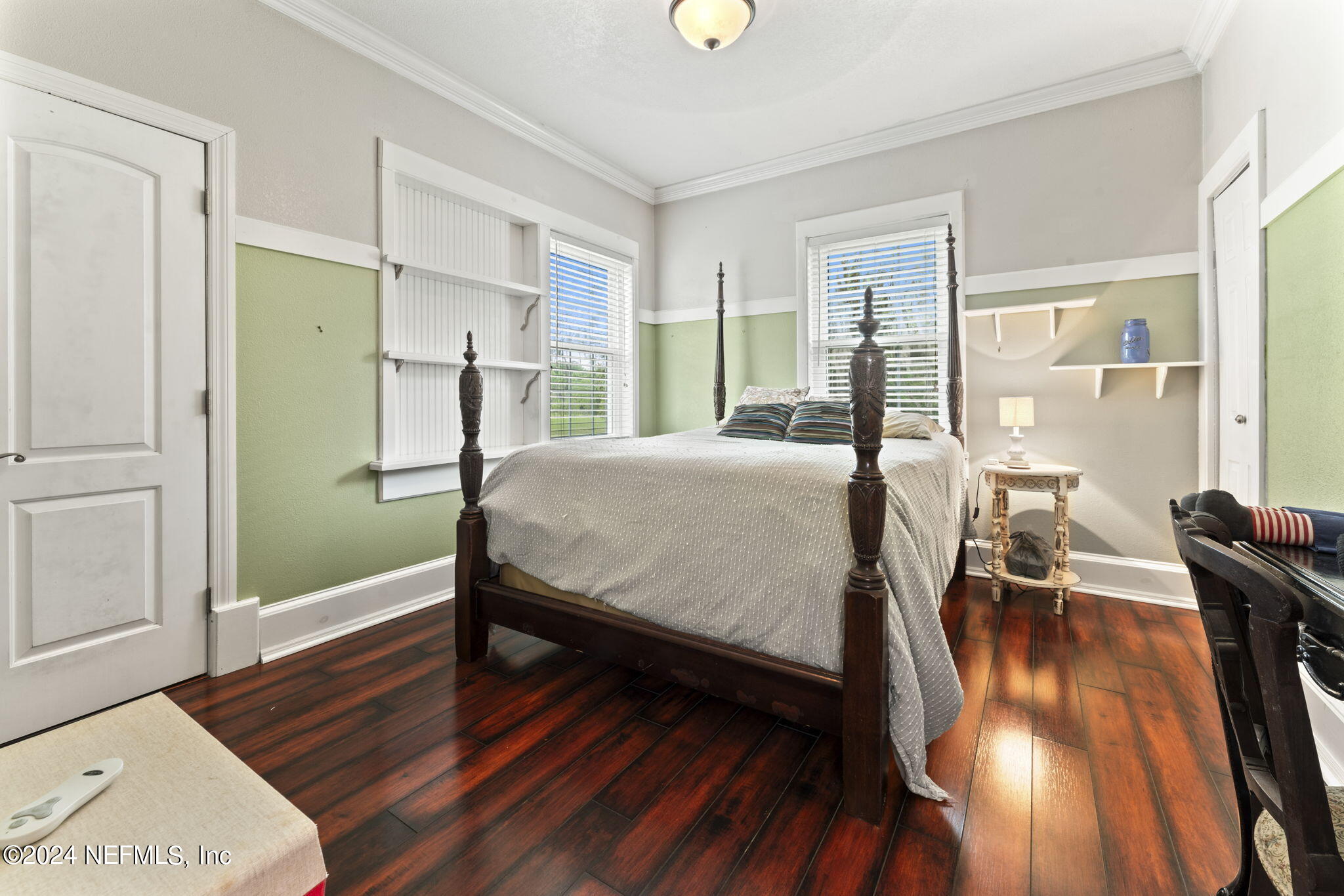 542284 Lem Turner Road Callahan, FL 32011 - Photo 26 of 84 a bedroom with a bed and wooden floor