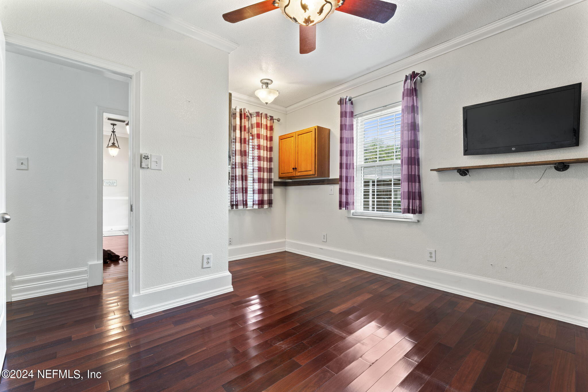 542284 Lem Turner Road Callahan, FL 32011 - Photo 36 of 84 a view of room with wooden floor and flat screen tv