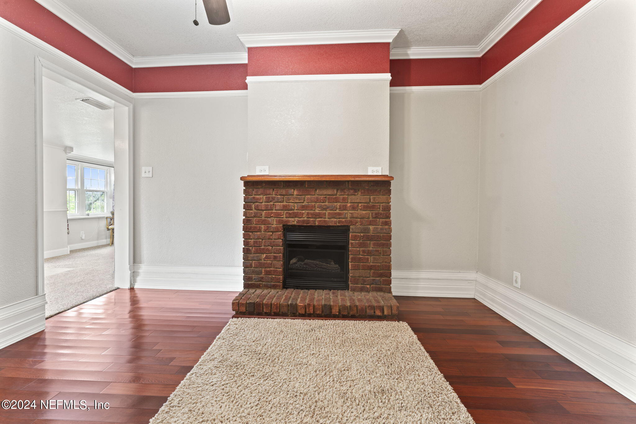 542284 Lem Turner Road Callahan, FL 32011 - Photo 39 of 84 a living room with a fireplace