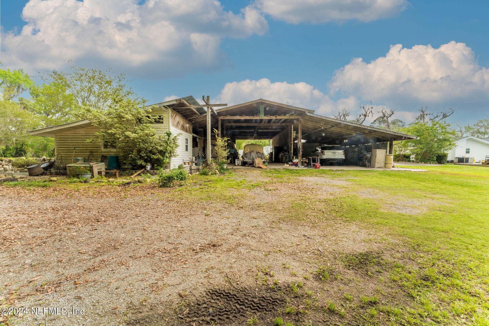 542284 Lem Turner Road Callahan, FL 32011 - Photo 69 of 84 a view of a house with a yard